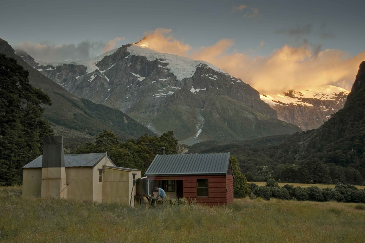 Top Forks Hut with dawn light on Mt Pollux. Photo: Shaun Barnett