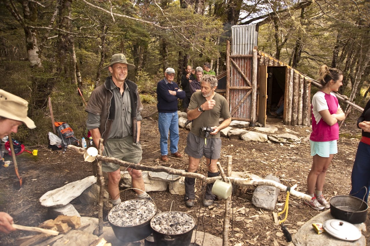 John Taylor and Geoff Spearpoint prepare camp oven scones. Photo: Shaun Barnett/Black Robin Photography