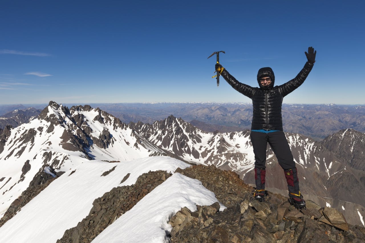 A real sense of achievement at climbing the highest mountain outside the Southern Alps. Photo: Mark Watson