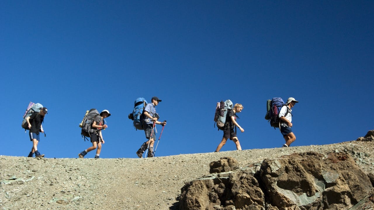 Traversing a narrow ridgeline en route to Hunters Hut