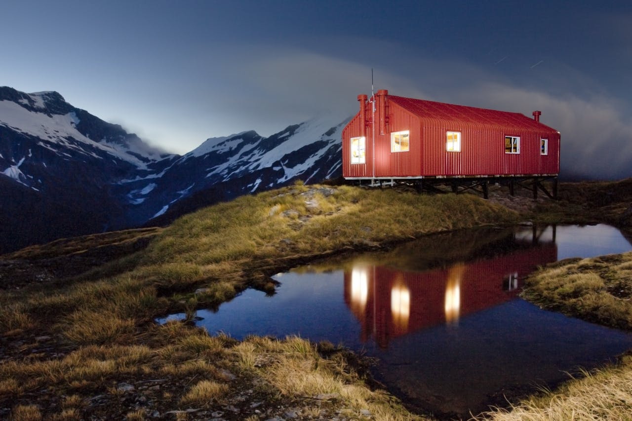 A torch is used to paint French Ridge Hut in light. Photo: Ray Salisbury