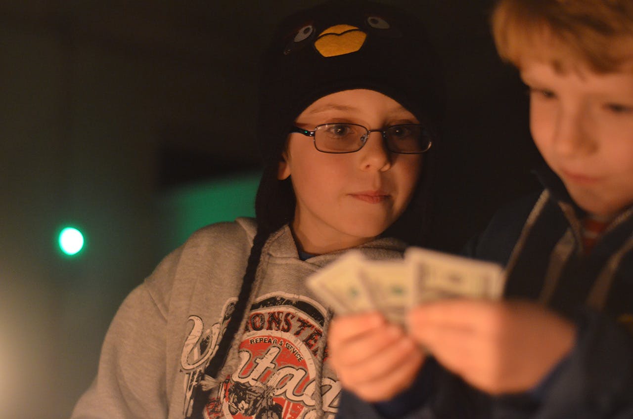 A game of cards after a hard day's tramp. Photo: Ricky French