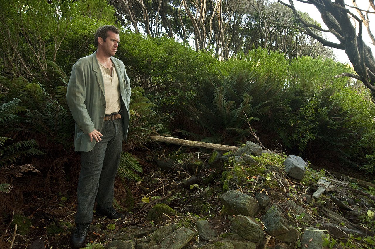 Jamie Fitzgerald at the ruins of Epigwaitt Hut on the Auckland Islands. photo: Shaun Barnett