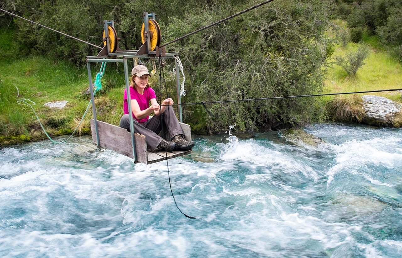 Brennan enjoys a ride on the flying fox across Lake Creek. Photo: Dennis Radermacher