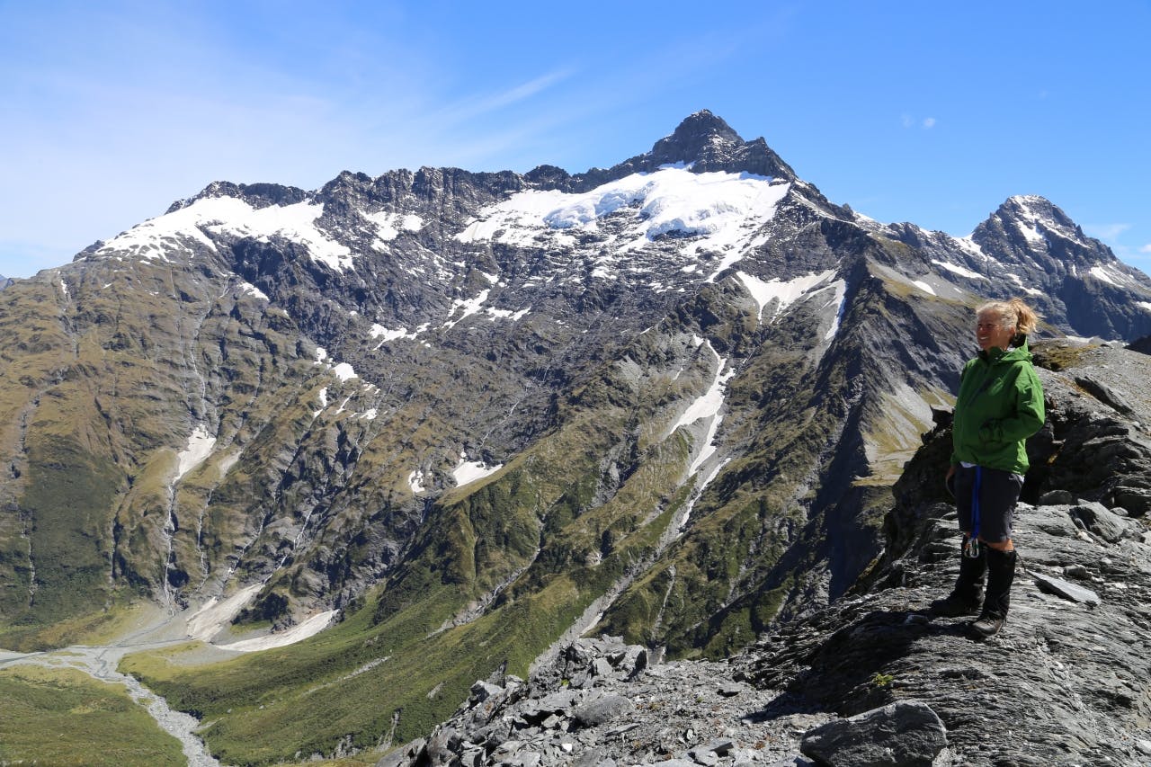 Michelle takes in the views before the descent from Rabbit Pass with Pickelhaube behind.
