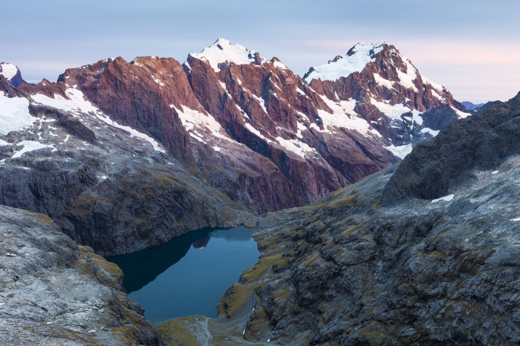Lake Turner with the Central Darrans peaks of Makere, Tarewai, Milne, Tutoko and Madeline beyond. Photo: Mark Watson