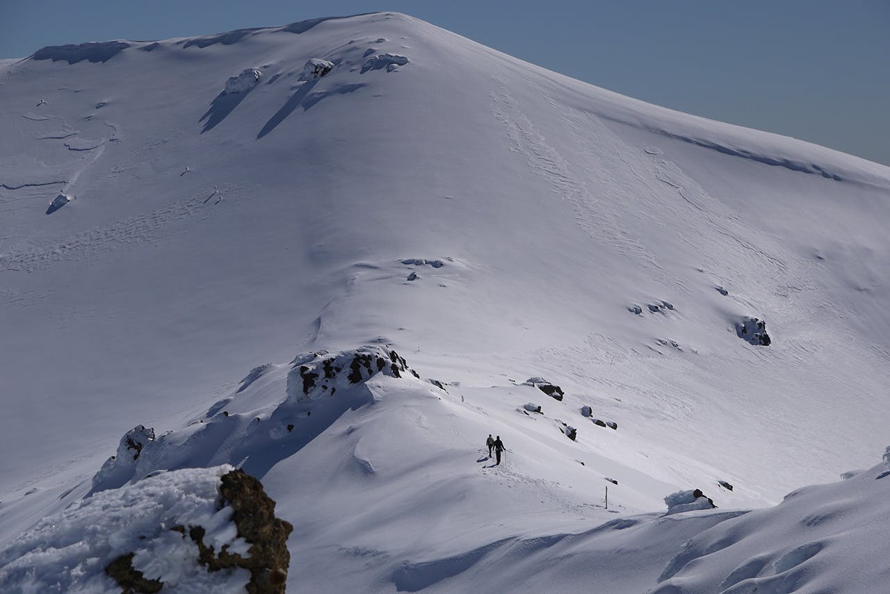 Trampers on the ridge leading to Mt Tongariro. Photo: Alistair Hall