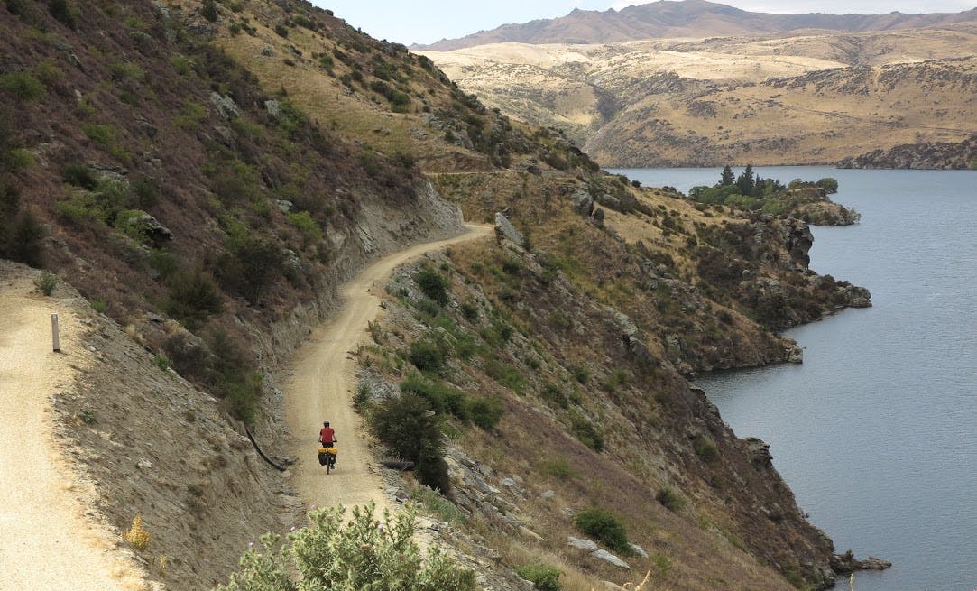 Dodging rabbits high above the man-made Lake Roxburgh. Photo: Dan Slater