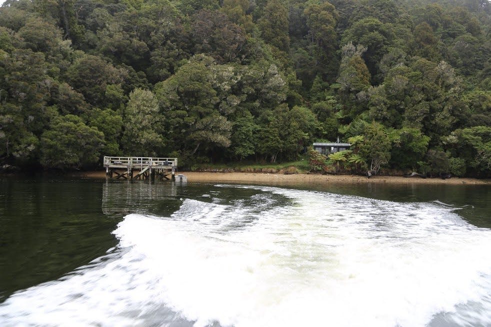 Leaving Freds Camp Hut by water taxi. Photo: Alistair Hall