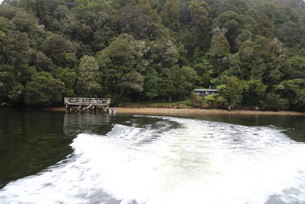 Leaving Freds Camp Hut by water taxi. Photo: Alistair Hall 