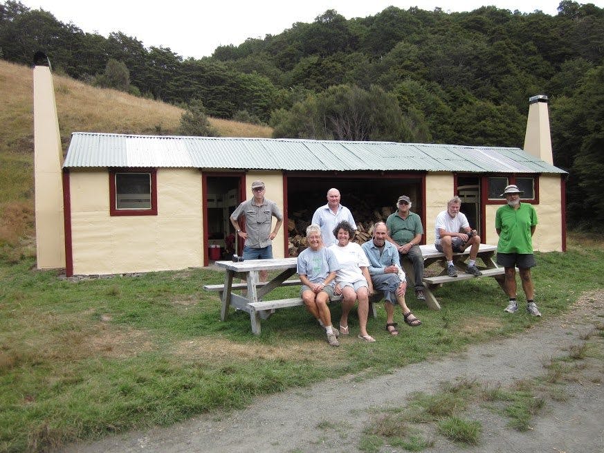 Volunteers from Nelson Tramping Club after a hard day's work at Flora Hut. Photo: Ian Morris 