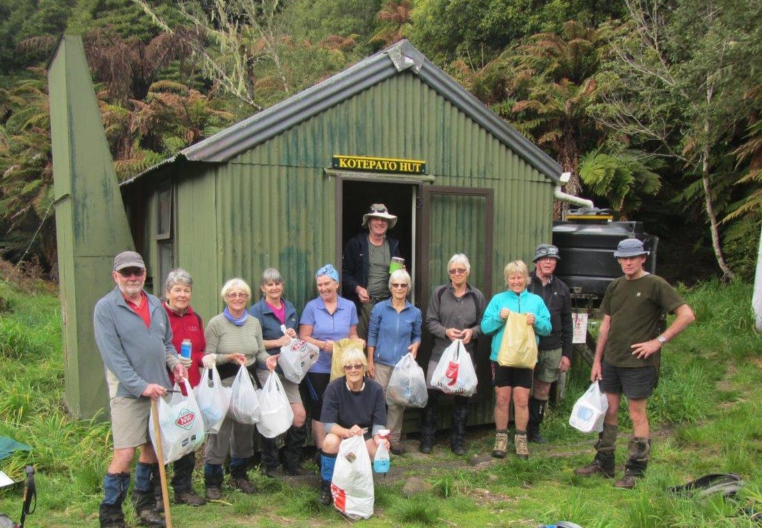 The team outside Kotepato Hut after the big clean-up. Photo: Supplied
