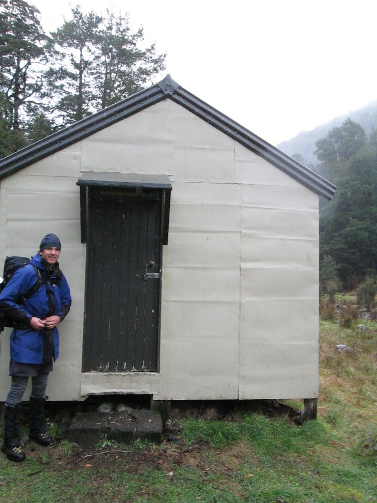 The author outside Mid Robinson Hut