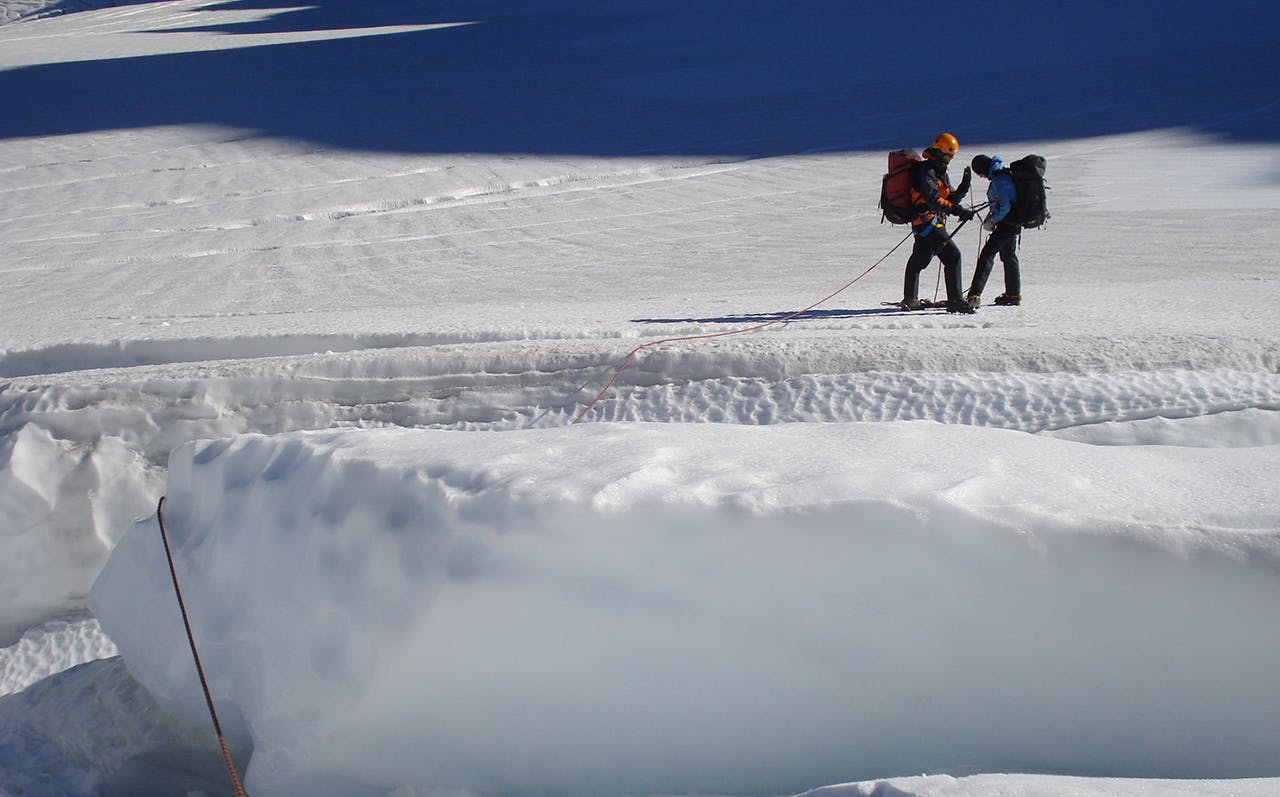 Negotiating a large crevasse. Photo: Nick Ross