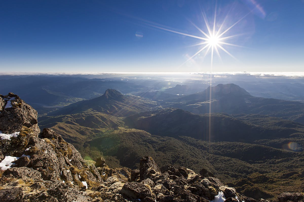 Feel the sun on your face and gain impressive views from the northern peak of Hikurangi. Photo: Mark Watson