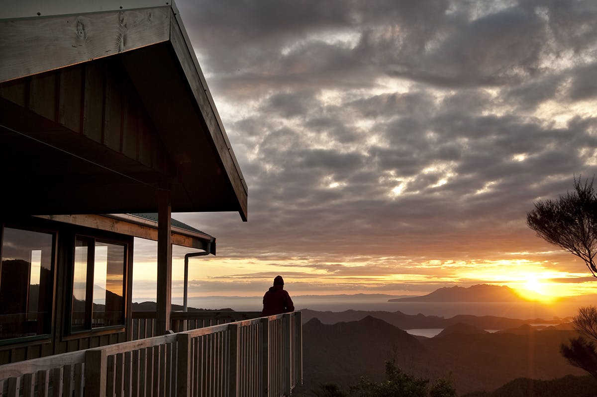Sunset over Little Barrier Island from Mt Heale Hut. Photo: Shaun Barnett/Black Robin Photography