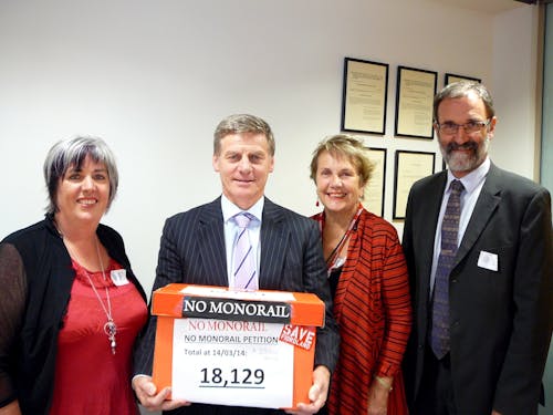 Bill English is presented with the Save Fiordland petition opposing the Fiordland monorail