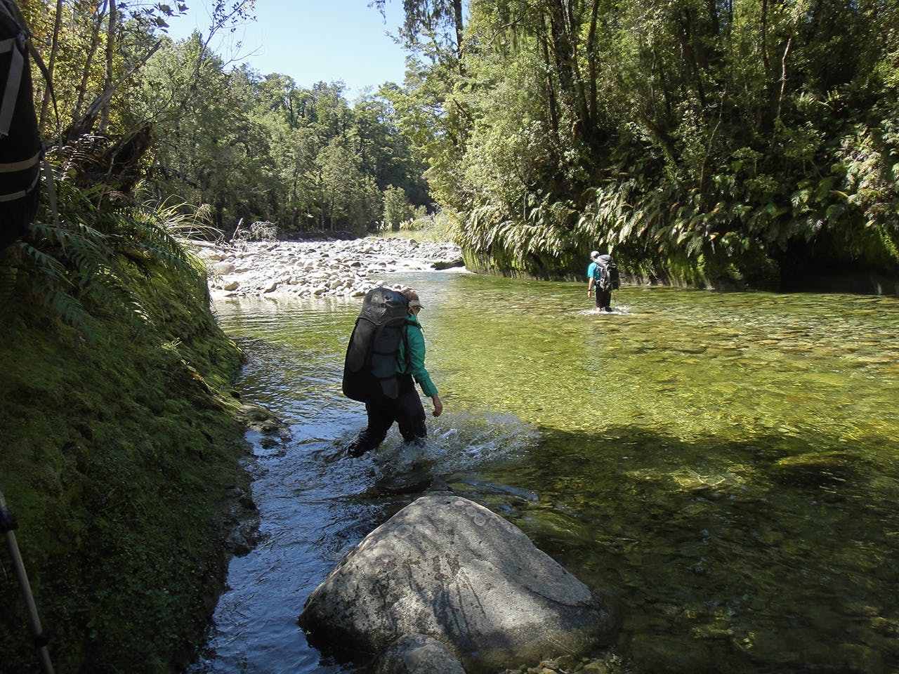 Travelling up the Nile River to avoid the thick bush of the Paparoa Range. Photo: Christian Martin