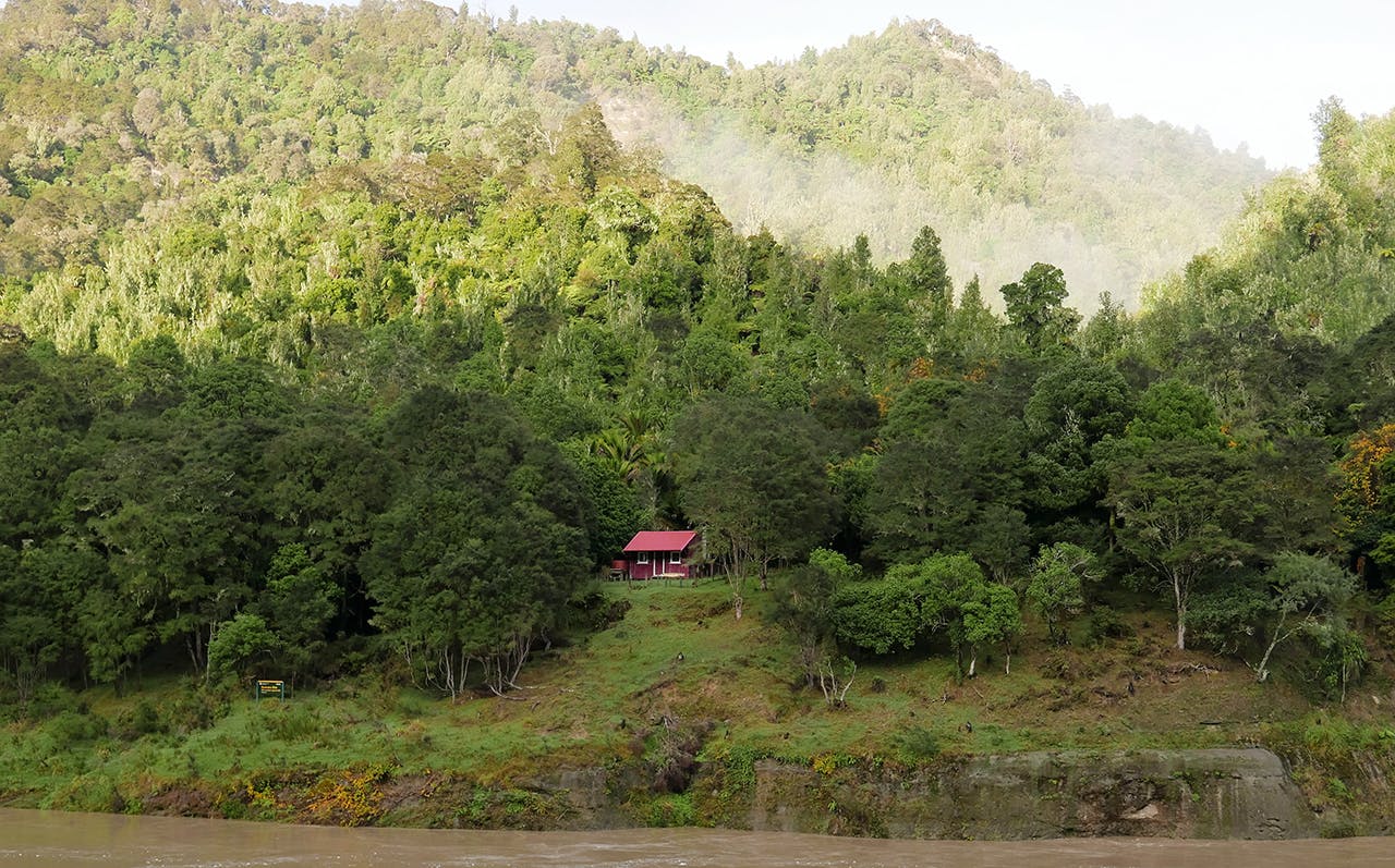 Just across from Atene is Downes Hut – accessed by jet boat or canoe. Photo: Kathy Ombler