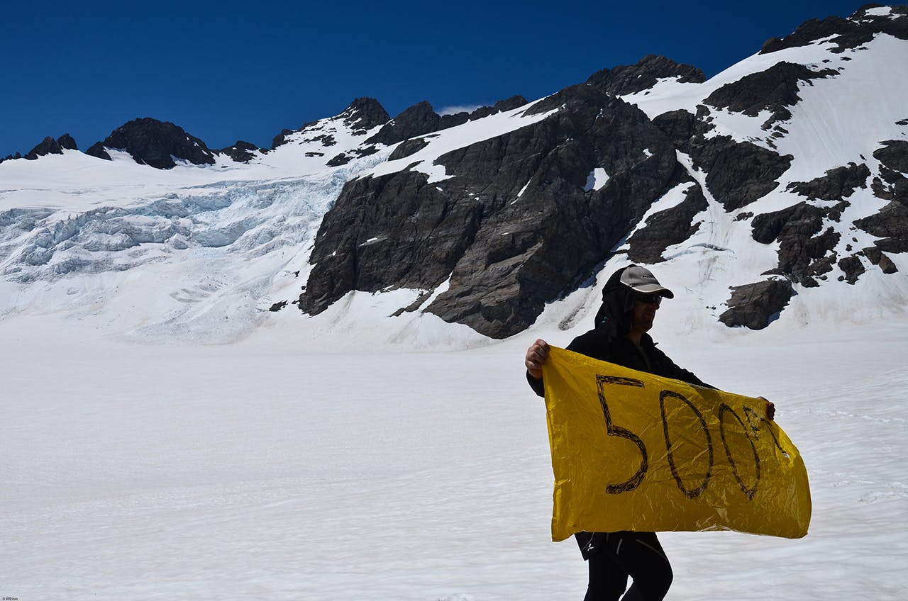 Trampers raised this sign to the helicopters on the Olivine Ice Plateau. Photo: Ben Wilson