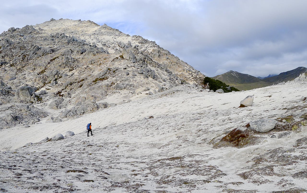 Ascending the eastern flank of Mt Titiroa. Photo: Nic Low
