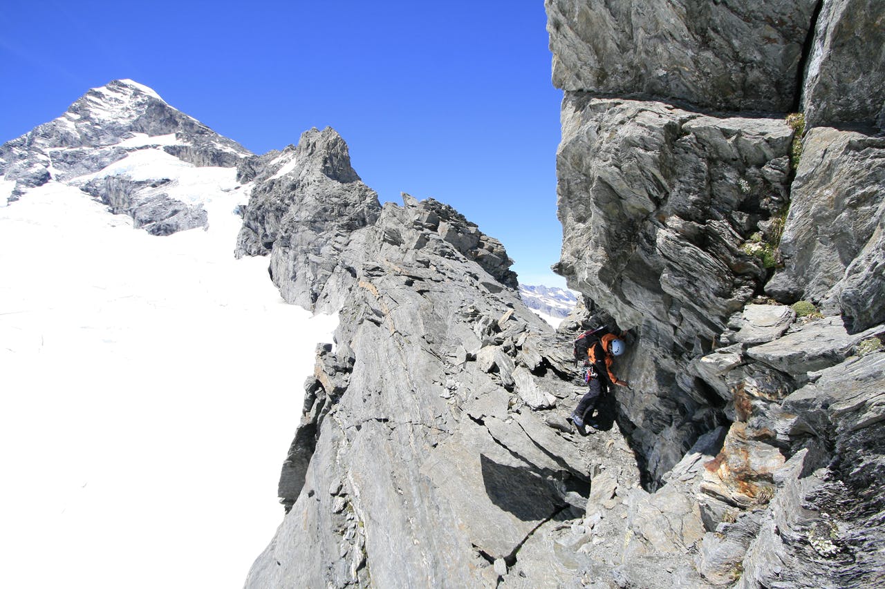 Traversing the lower section of the Aspiring's Northwest Ridge is generally considered the crux of the climb. Photo: Paul Hersey