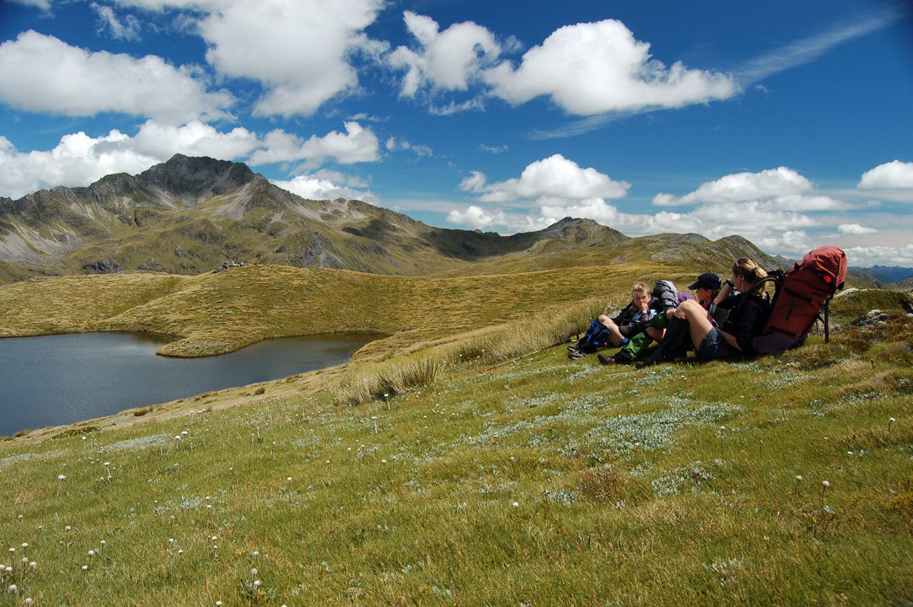 The tops here are scattered with many alpine tarns, providing great rest stops along the way. Photo: Jo Stilwell