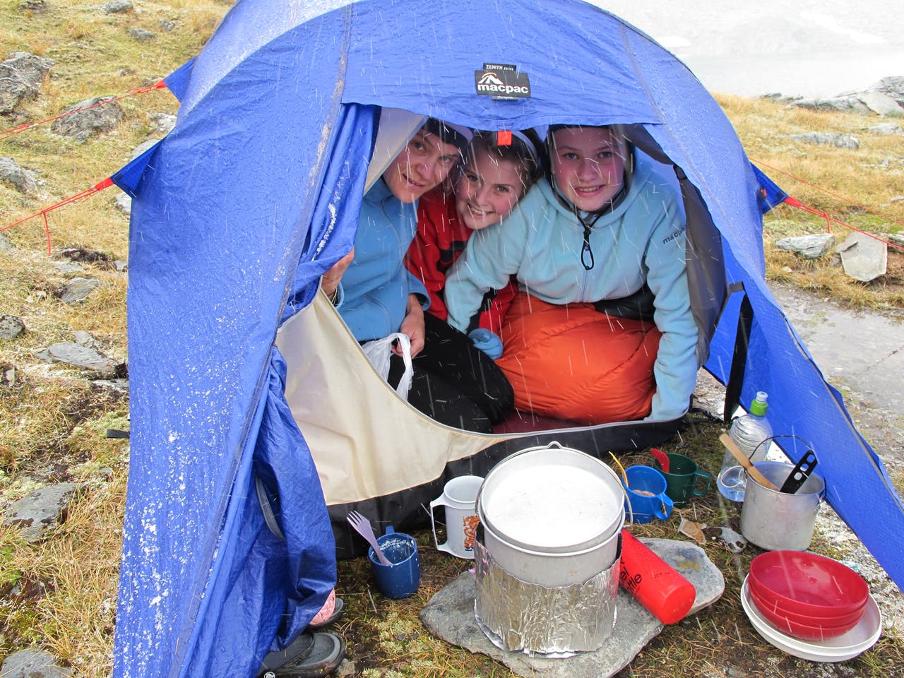 Be prepared to change your plans, Jo and the girls wait for clear weather. Photo: David Norton