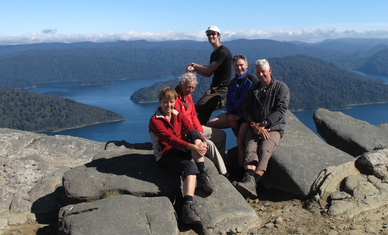 Taking a break on the guided Lake Waikaremoana trip. Photo: Walking Legends