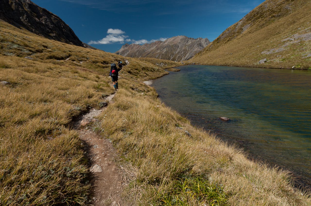 Crossing the main divide at the side of Tarn Col. Photo: Fraser Crichton