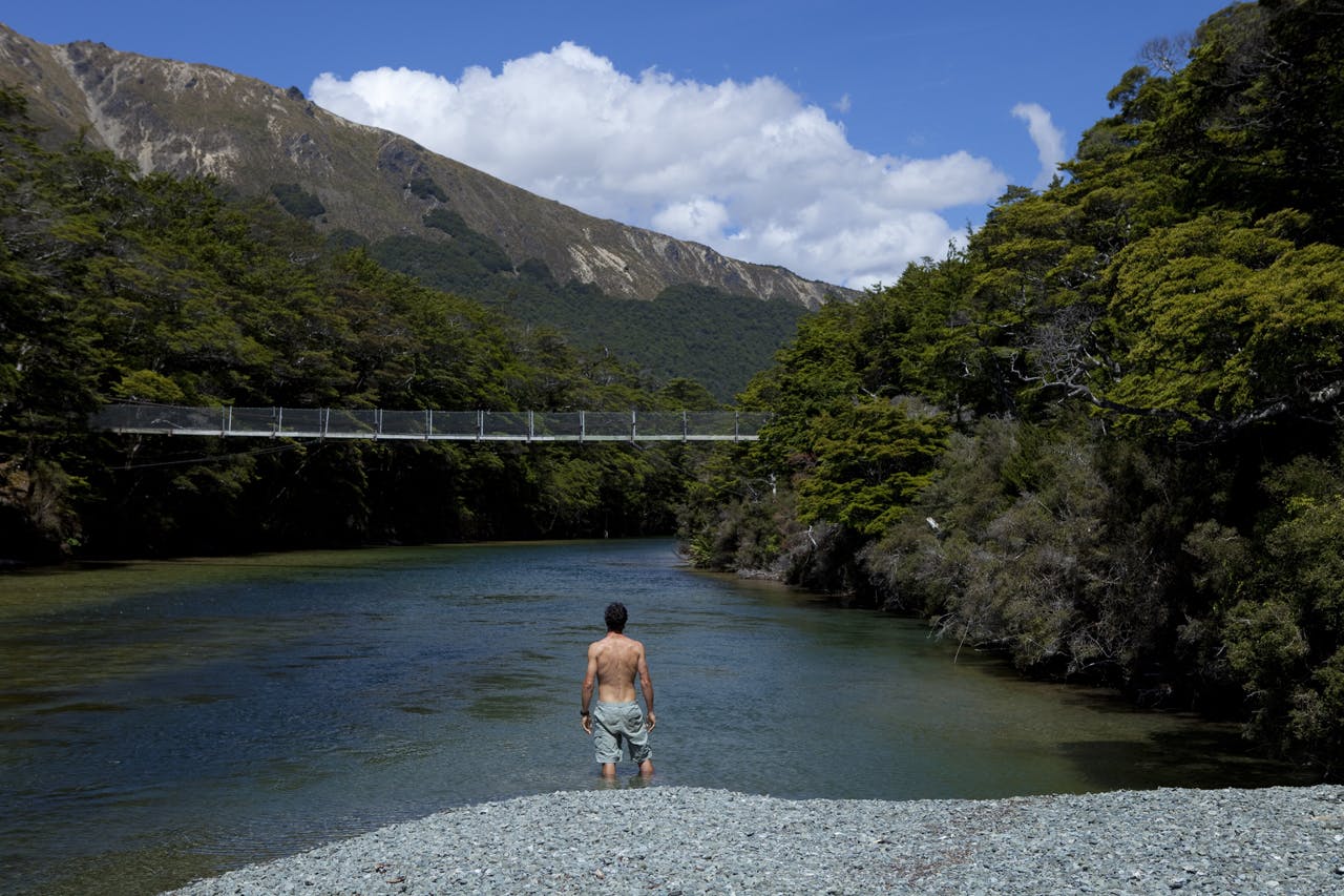 Dallas Hewett takes a dip at the outlet of the North Mavora Lake. Photo: Derek Morrison