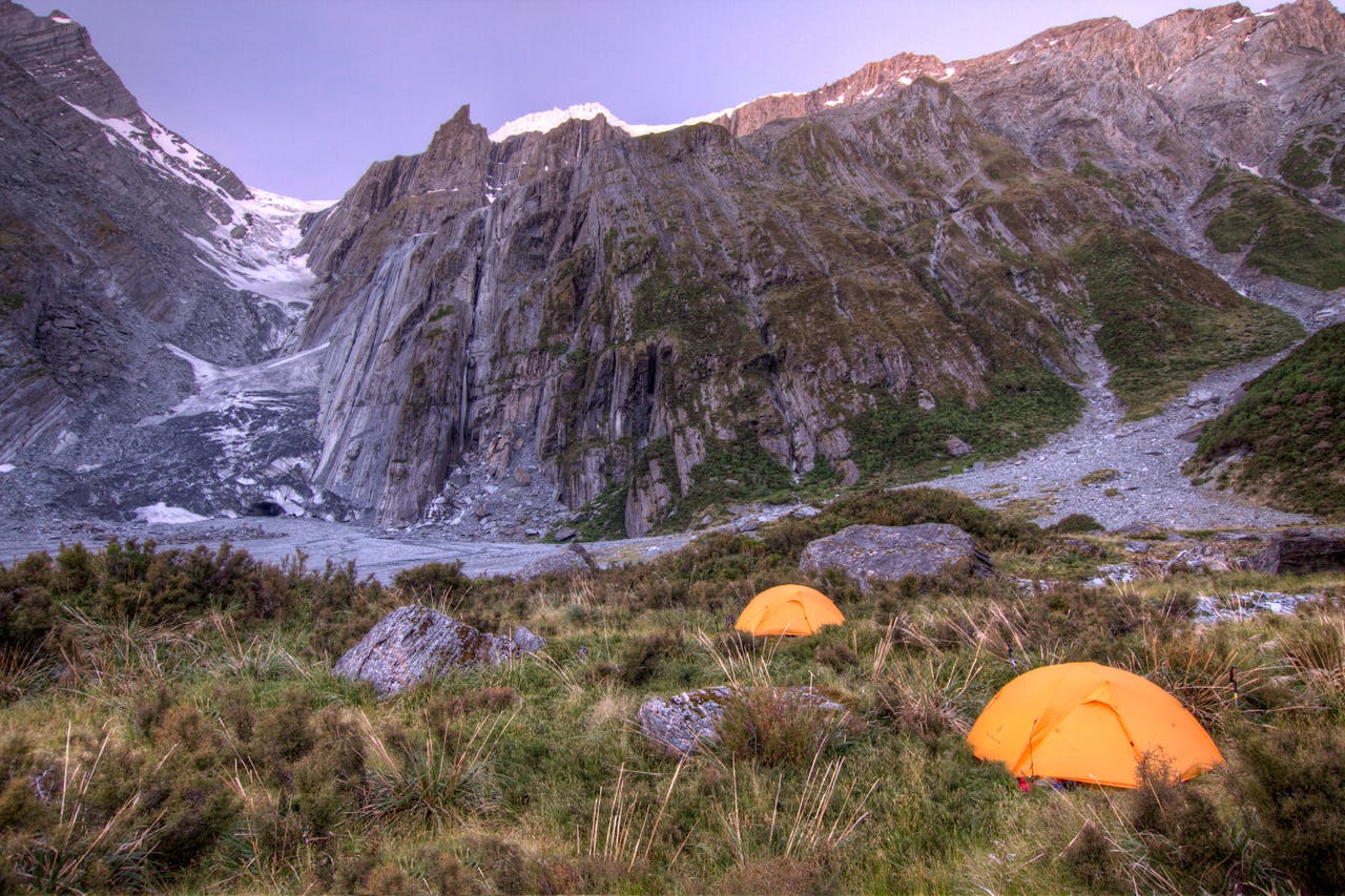 Camping beneath rivers of ice in the Upper Otoko Valley. Photo: Troy Mattingley