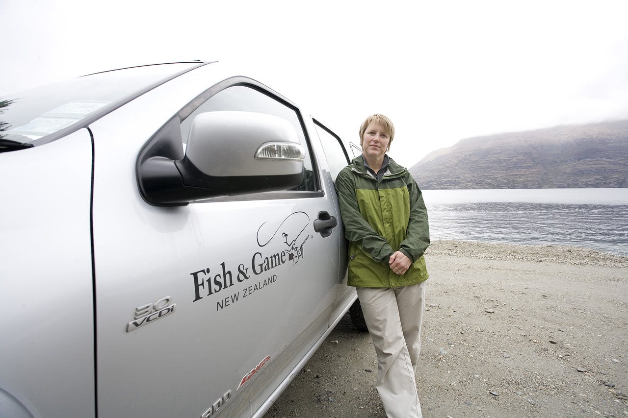 Fish and Game field officer Clare Morris on the job. Photo: Mark Banham 