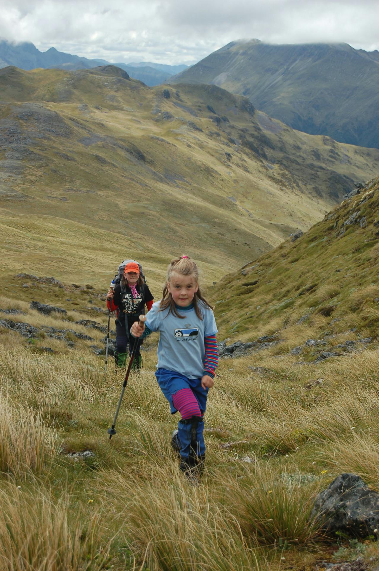 Mackenzie (in foreground) and Alice approach a low saddle on the ridge. Photo: Jo Stilwell