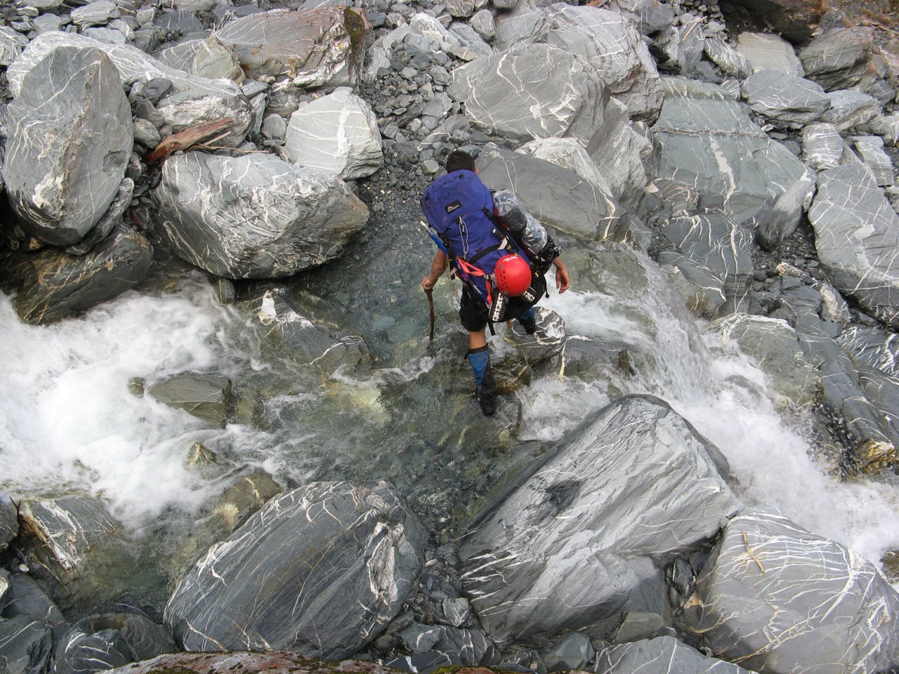 Darren negotiating a side creek
