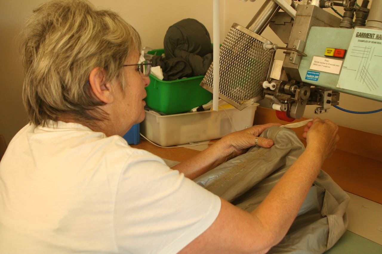 Learning how to use the seam sealer is a must for Macpac's design staff, who also apply a water pressure test to garments to check if they are waterproof