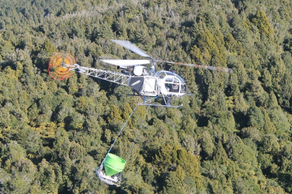 Using technology linked to satellites, 1080 can be spread by helicopters with remarkable accuracy. Photo: Supplied