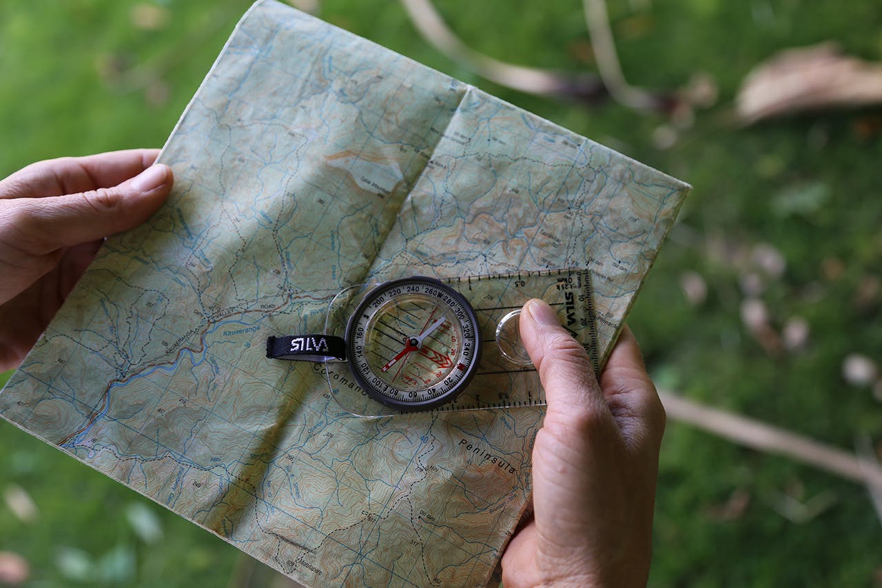 Use the compass baseplate edge to make a line from your current location to your destination