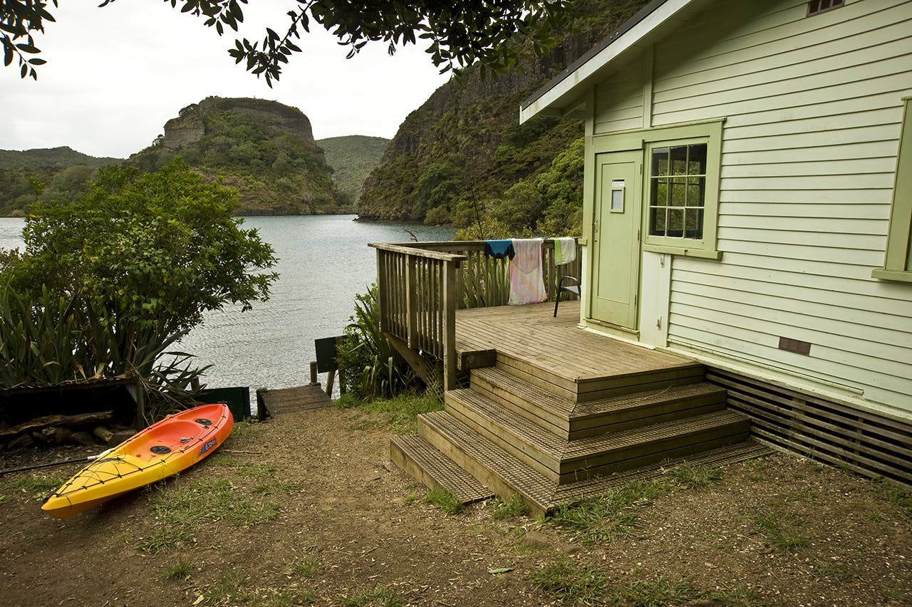 Lane Cove Hut overlooks Whangaroa Harbour. Photo: Shaun Barnett/Black Robin Photography