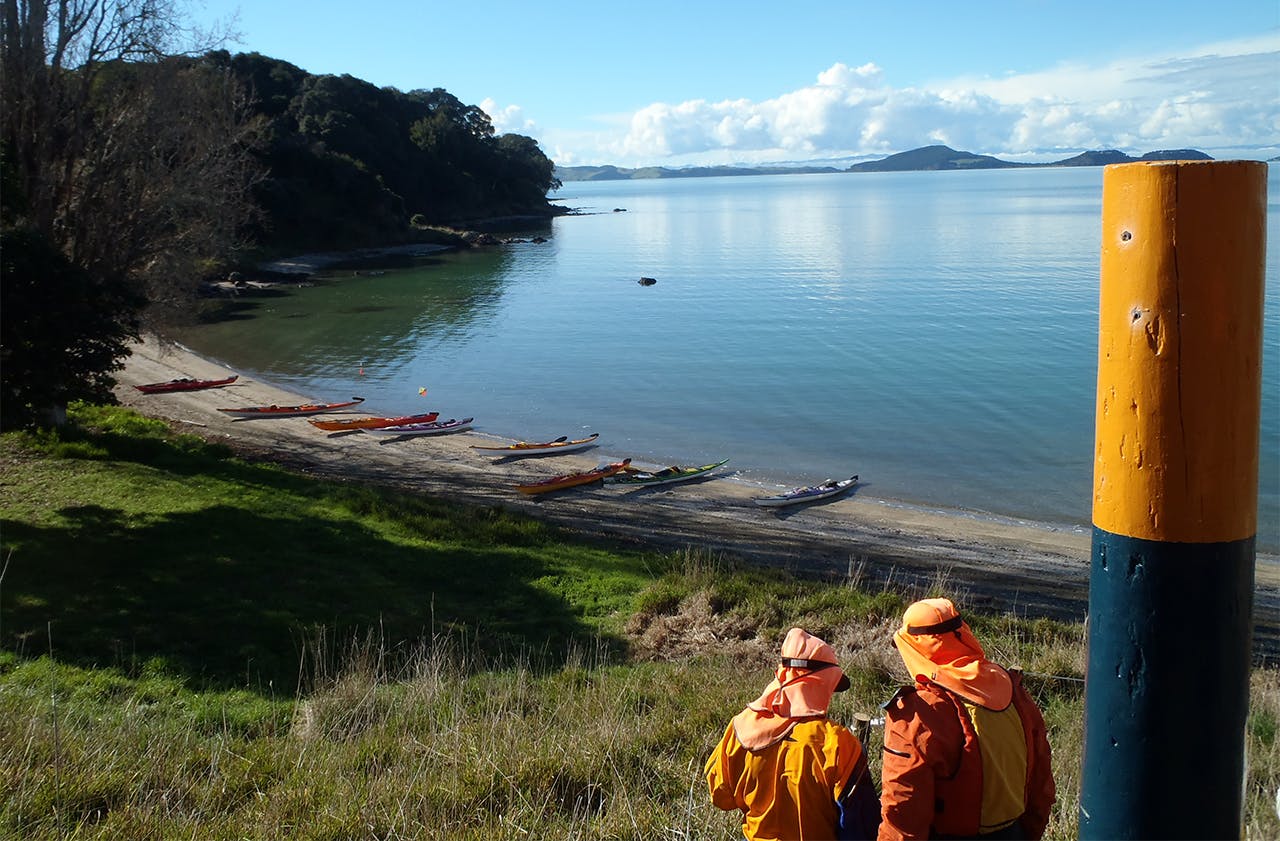 Kayaks on the beach, ready for the next section of Te Ara Moana. Photo: Ruth Henderson