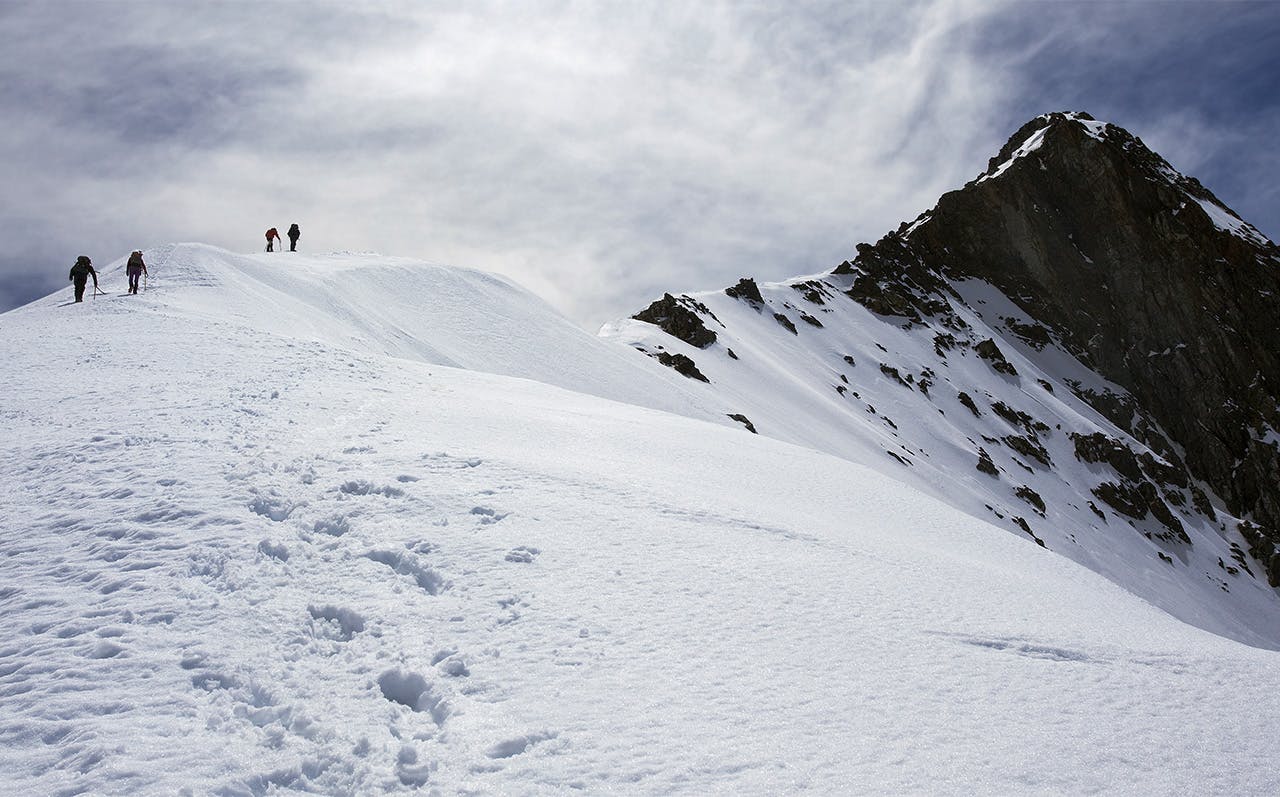Climbers negotiate firm snow toward the top of Tappy. Photo: Ray Salisbury