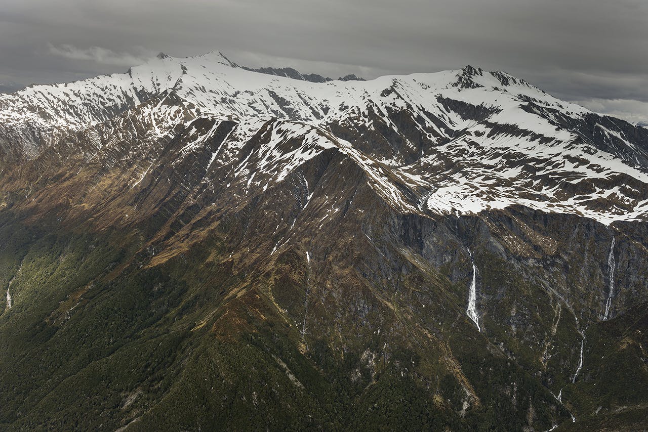 On the Cascade Saddle route, trampers leave the relative safety of the bush and suddenly find themselves in an alpine environment where they’re sometimes unprepared for the slippery slopes. Photo: Mike Wilkinson
