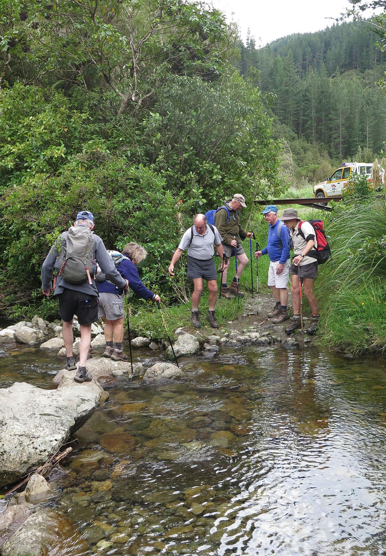 Crossing Makakahi Stream. Photo: Mike Cole