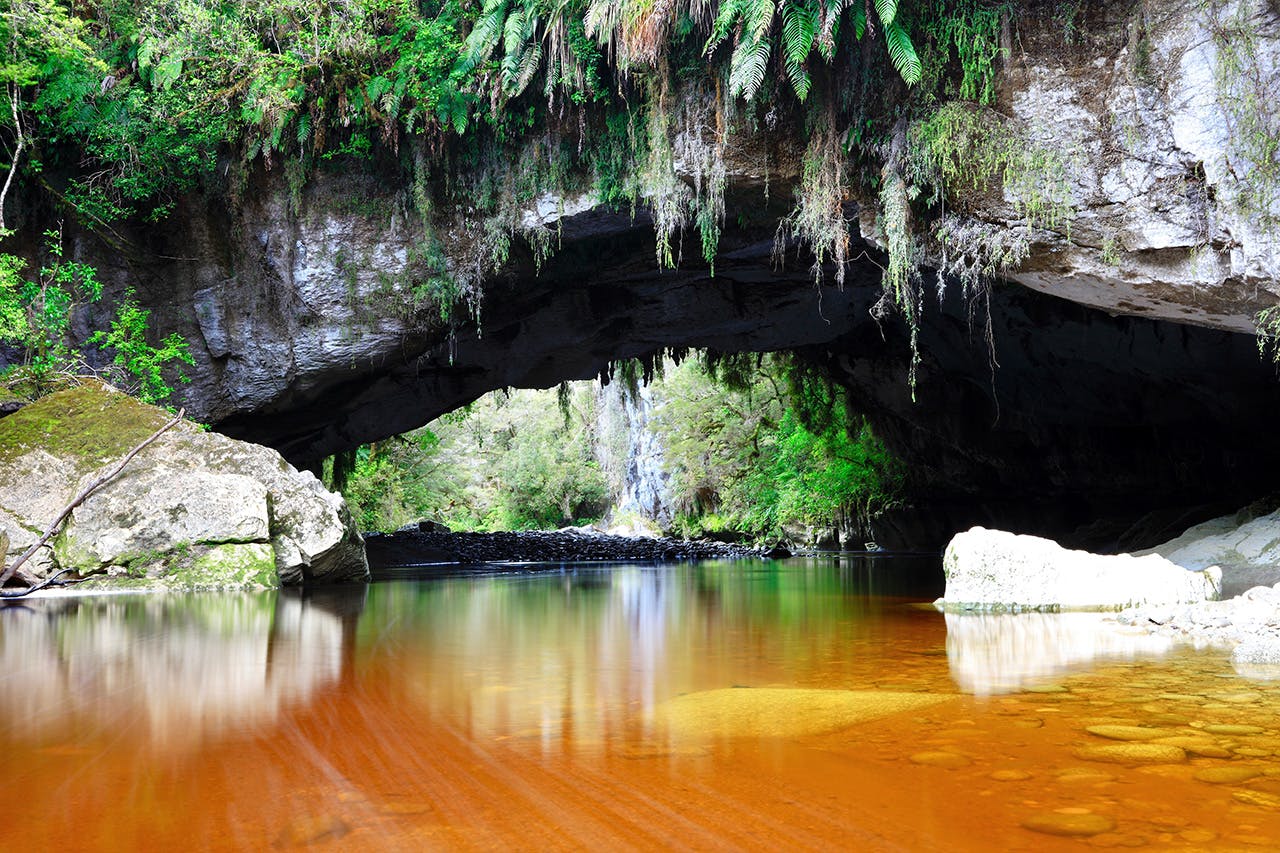 Oparara Arch has been sculpted by the Oparara River. Photo: Richard Rossiter