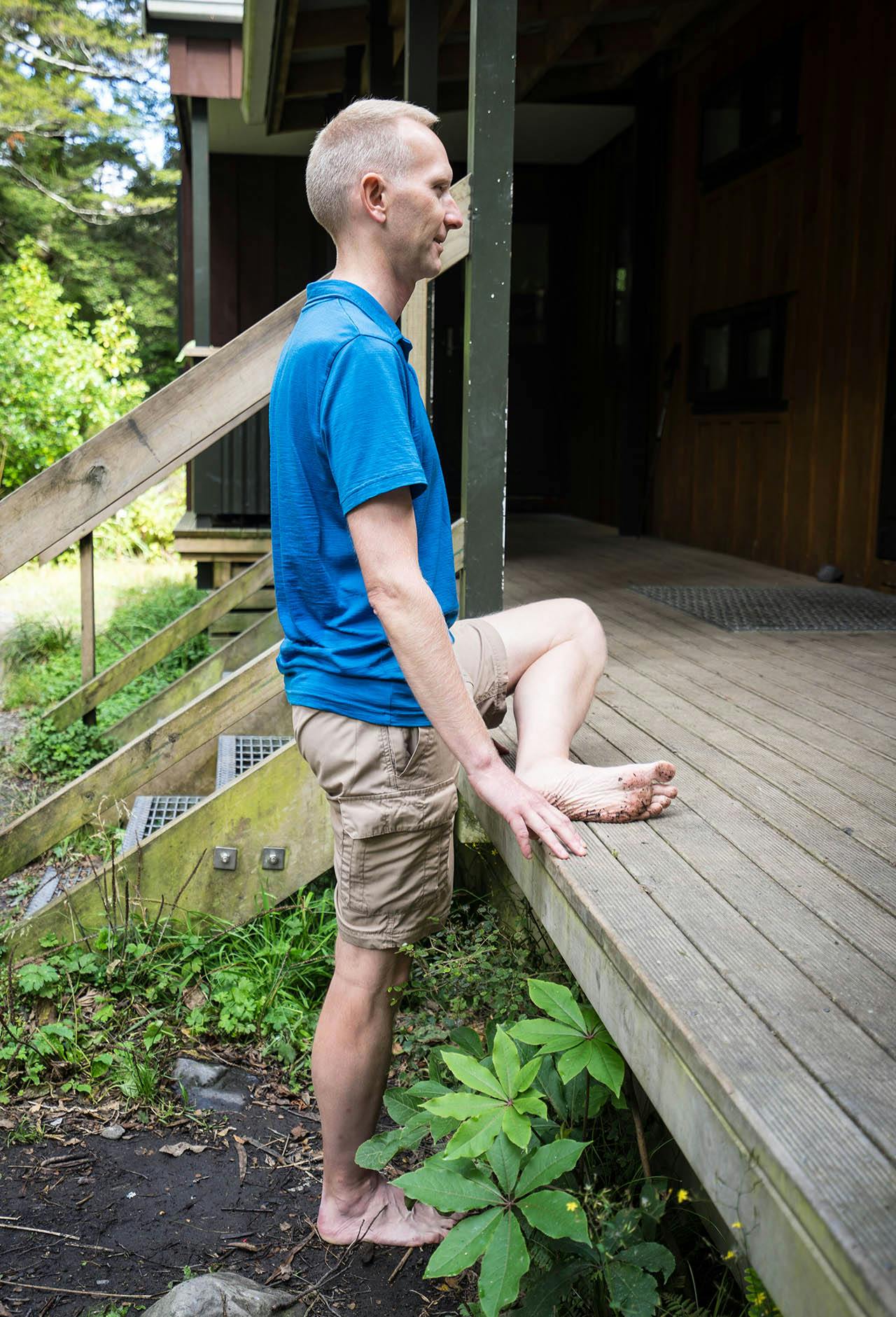 This stretch targets the outside of your hips and buttocks. Photo: Tony Gazley